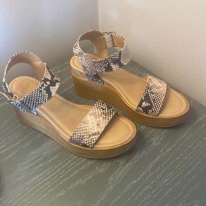Flat form snake print sandals
